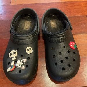 Black Crocs fleece lined with jibbitz- GUC😄J3
